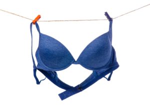 Photo of a bra hanging from a clothesline