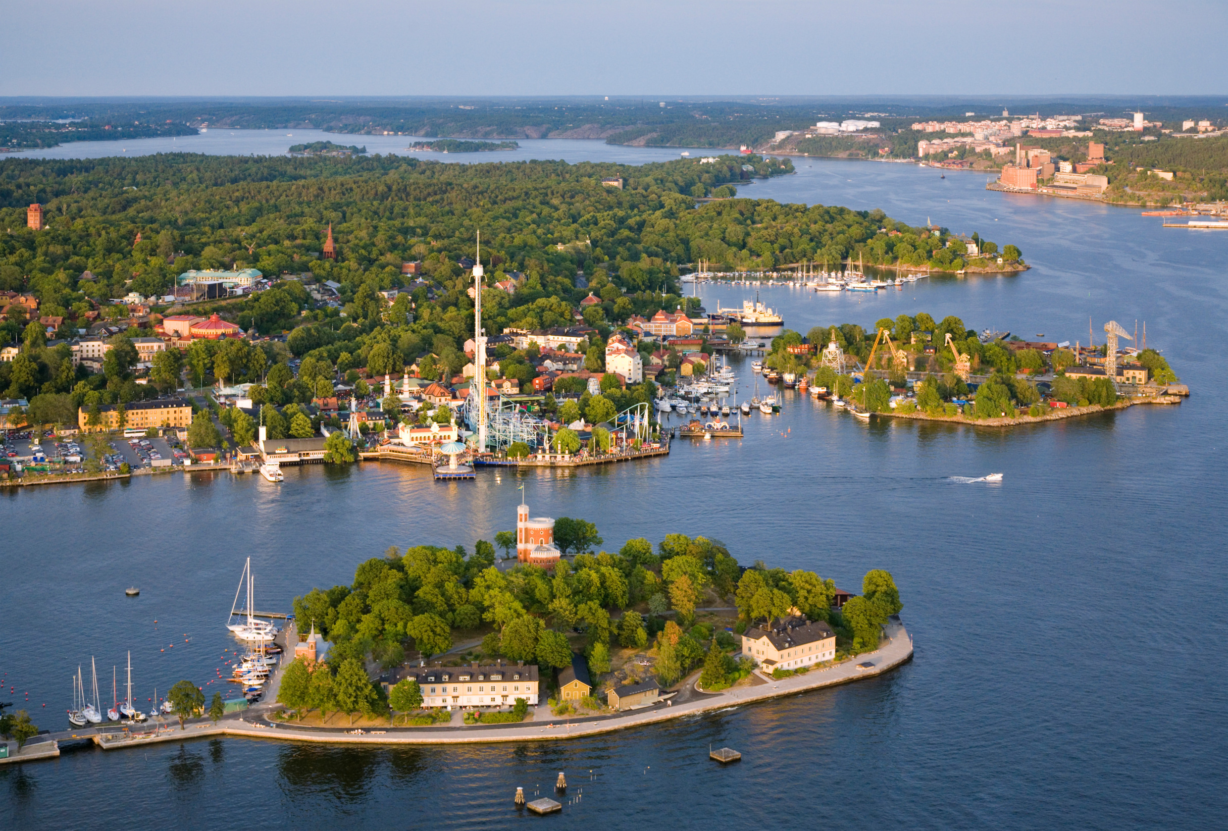 Aerial of Stockholm with Kastellholmen island in the foreground and Djurgården and the inner archipelago in the distance.