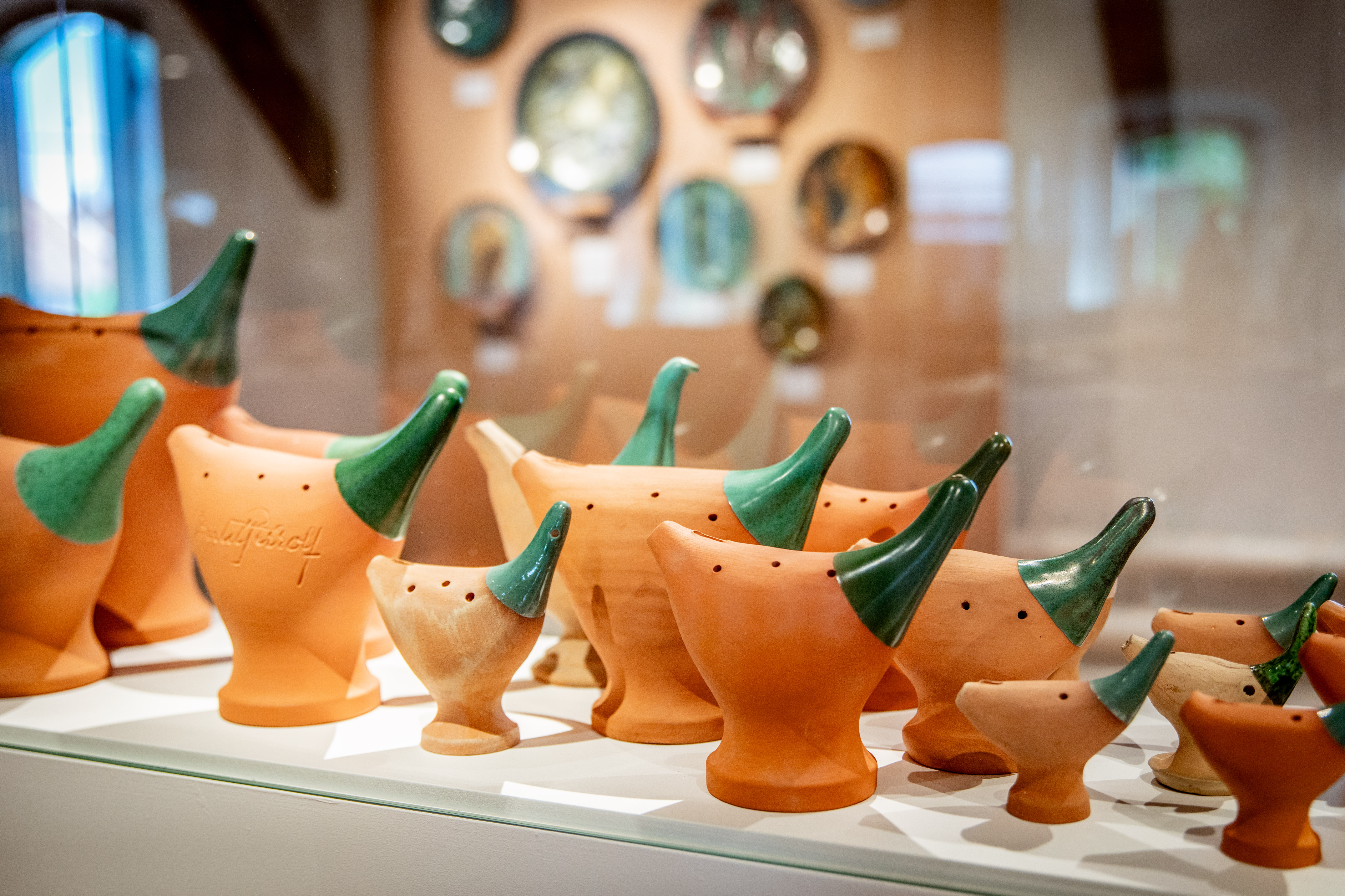 Artwork in orange and green.