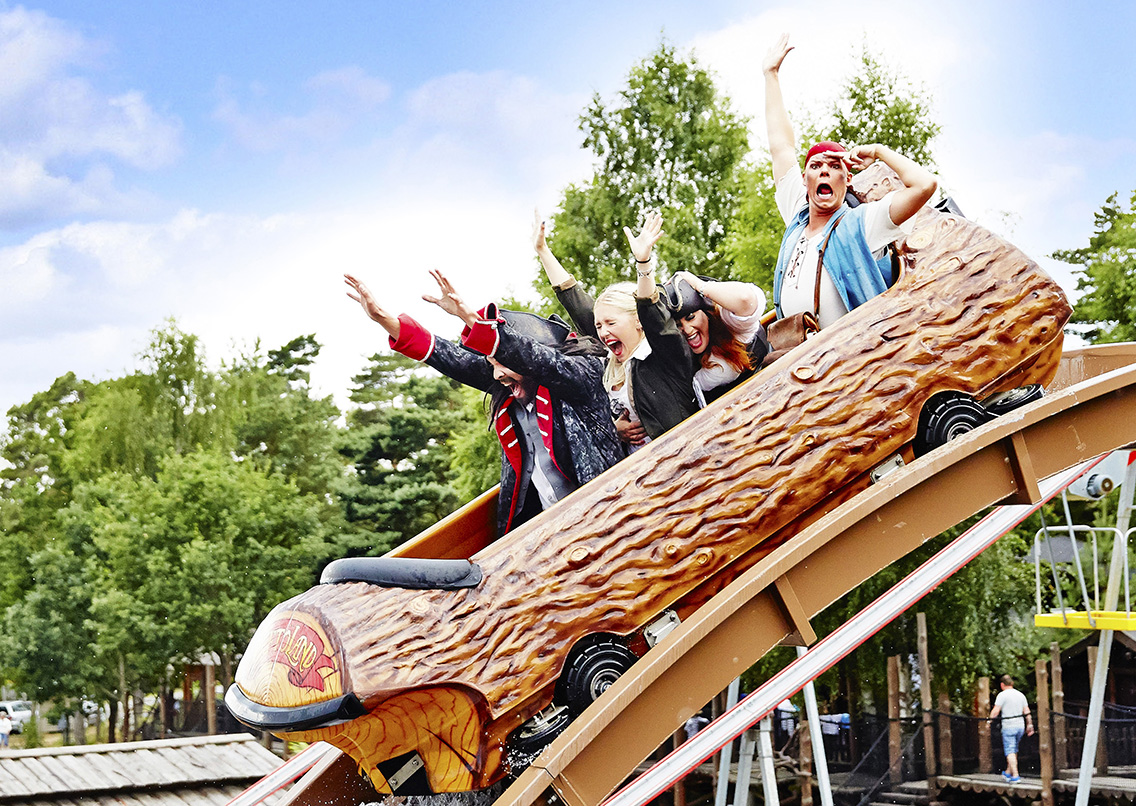 People riding a pirate-themed roller coaster at Daftöland amusement park at Daftö Resort in Bohuslän.