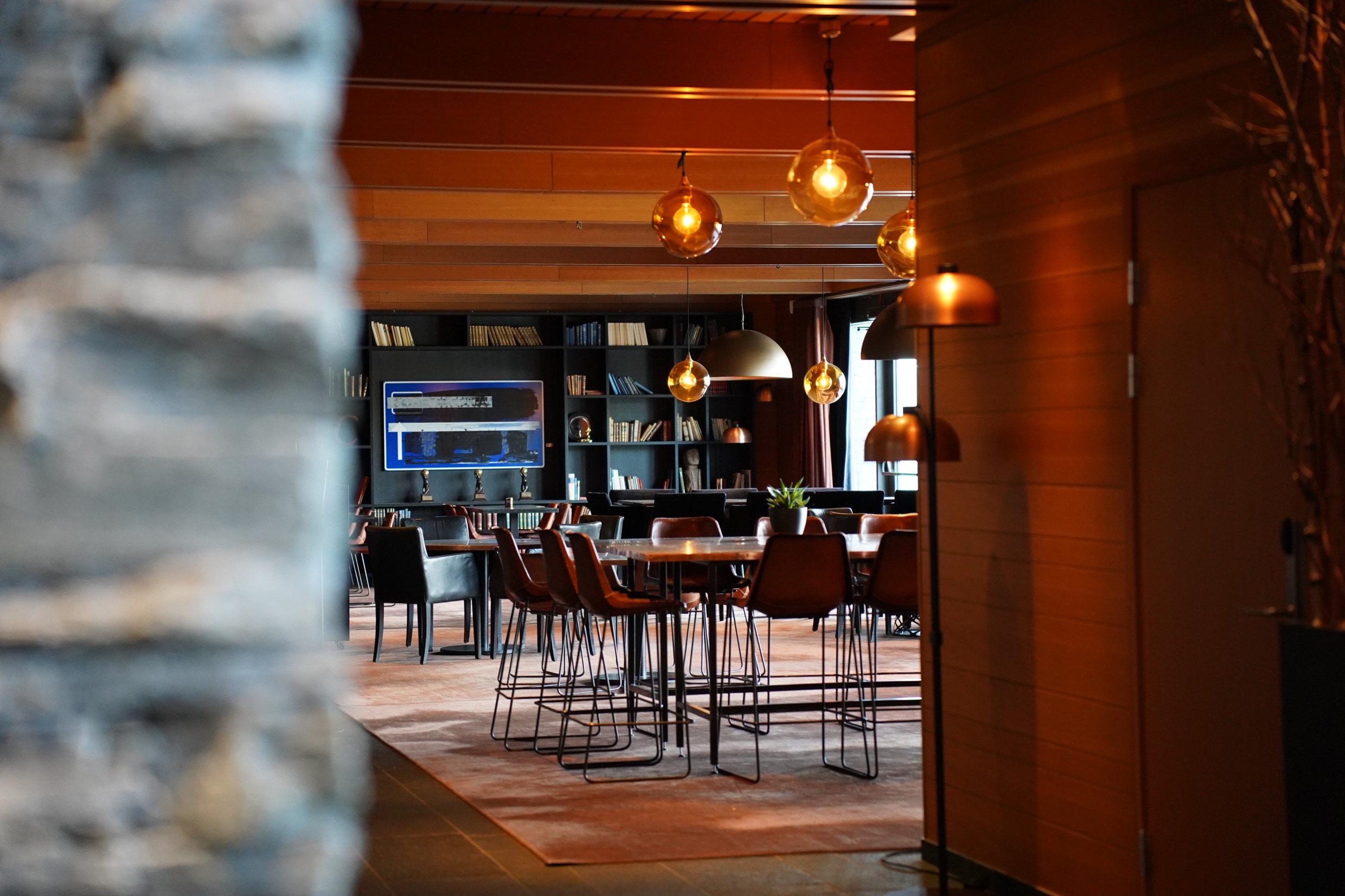 Tables and chairs in the common area at Copperhill Mountain Lodge.