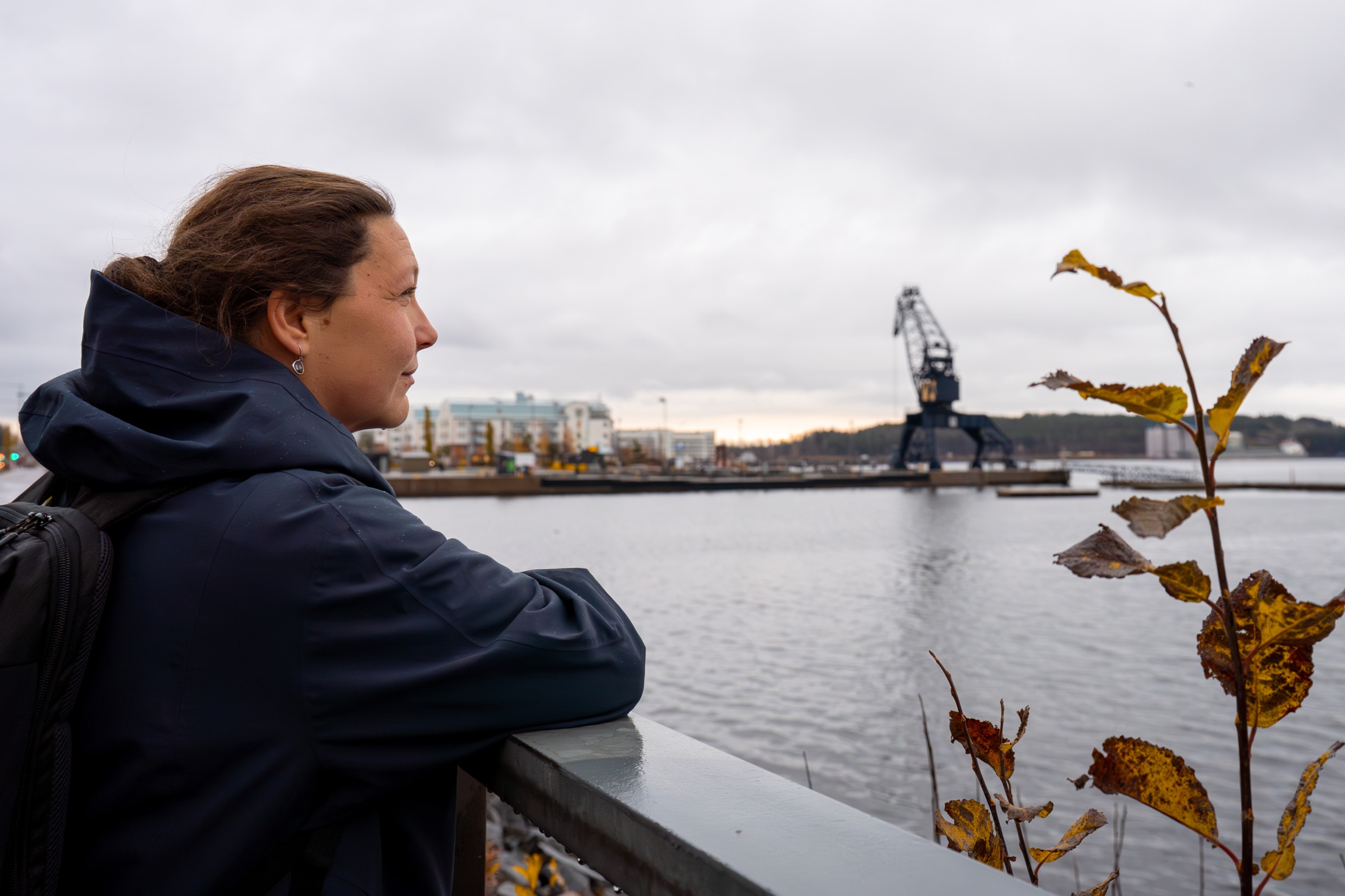 A woman looking out over Luleå town.