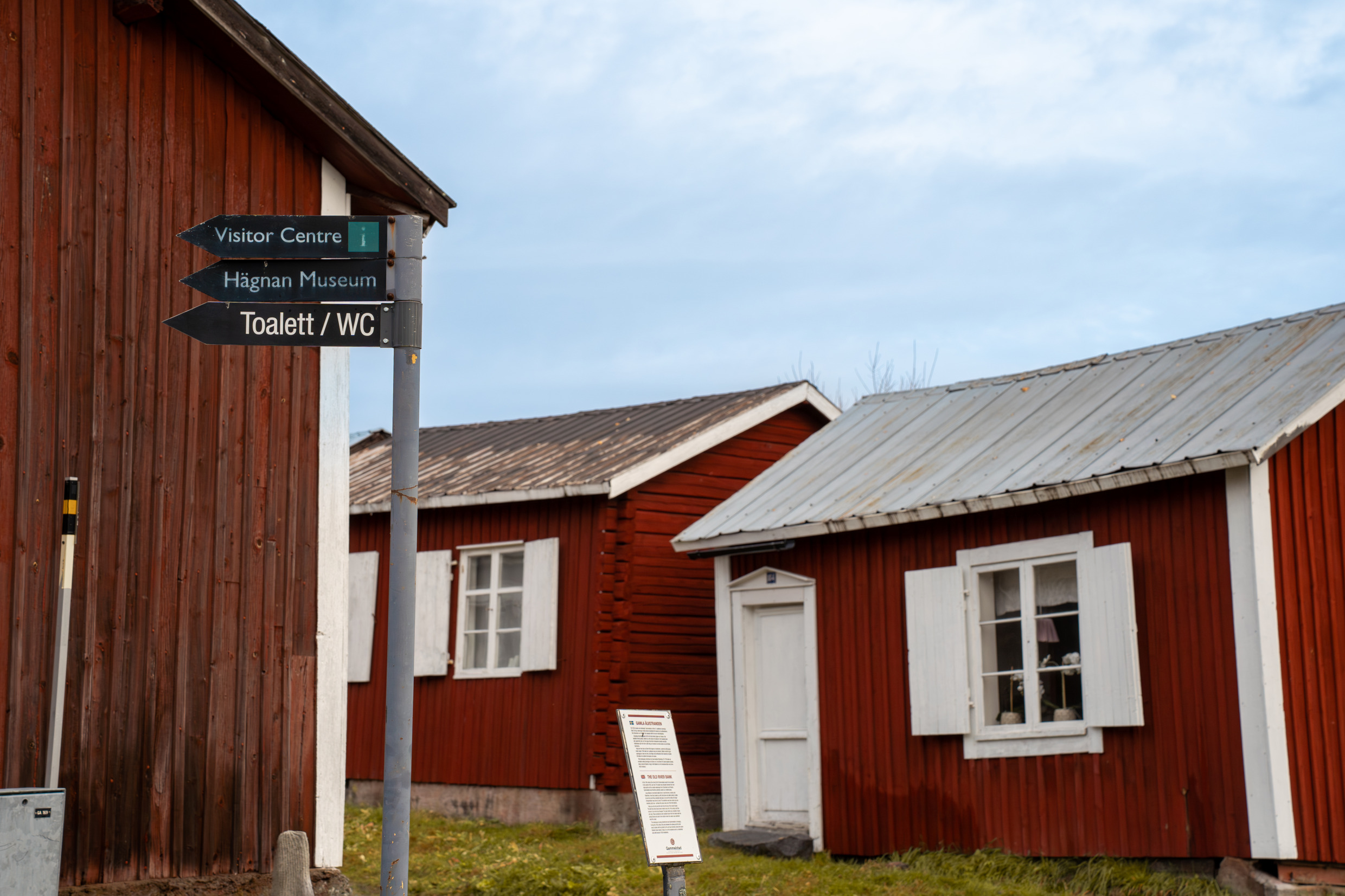 Red cottages with white corners.