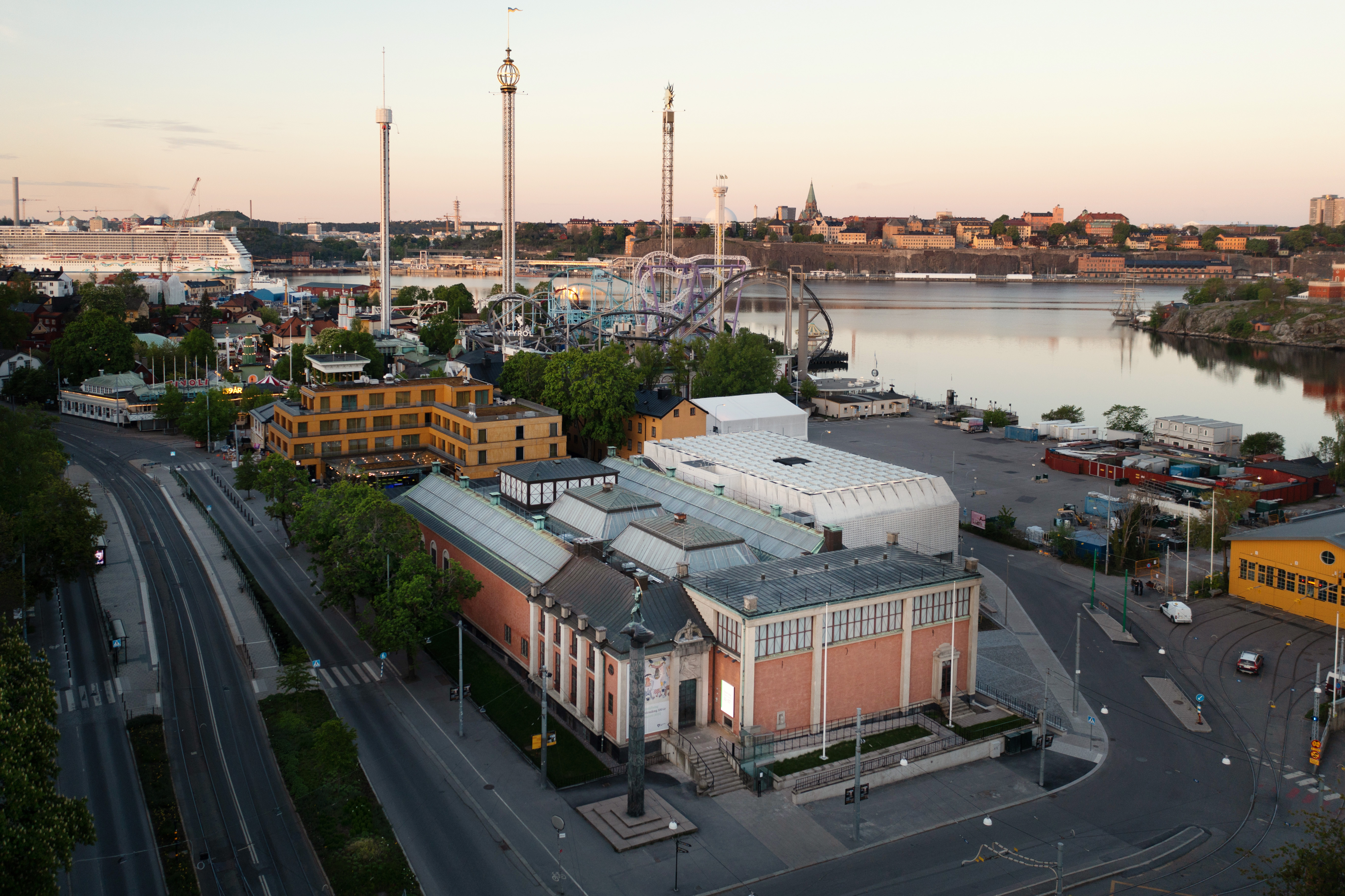 Aerial view of Liljevalchs art gallery on Djurgården, with Gröna Lund behind it and Stockholm’s waterfront in the background.