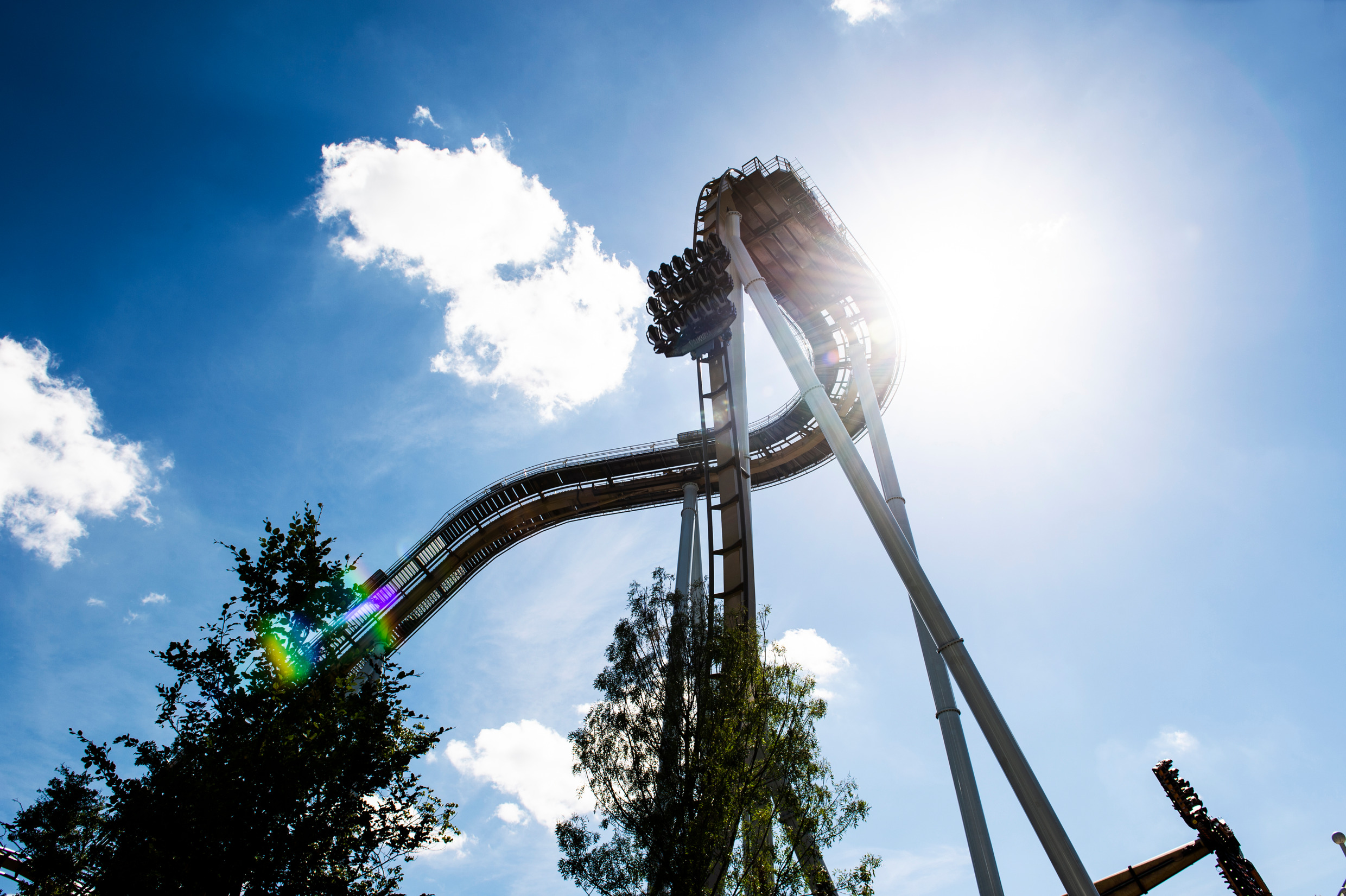 A tall roller coaster at Liseberg seen from the ground.
