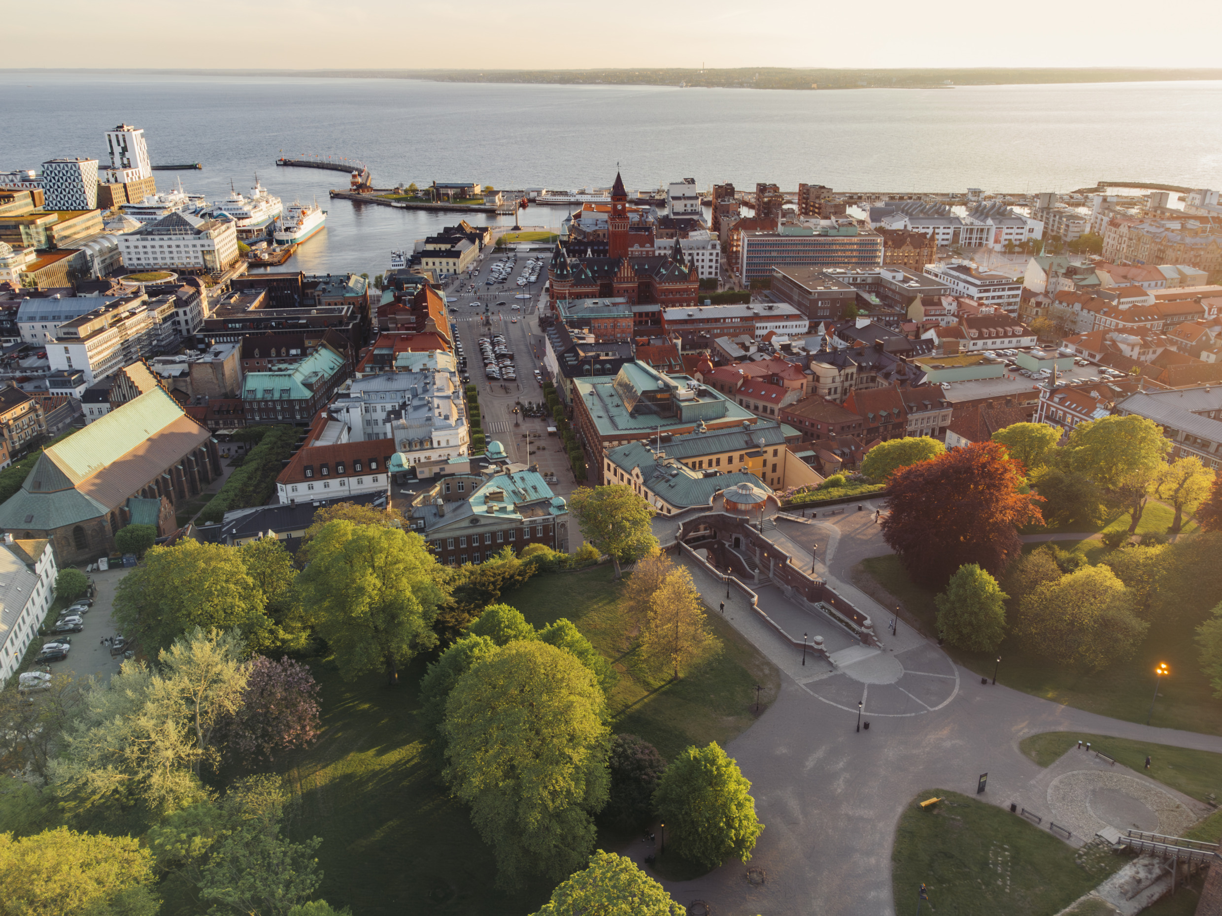 Aerial view from Helsingborg across the Öresund strait towards Denmark, with ferries connecting the two countries.
