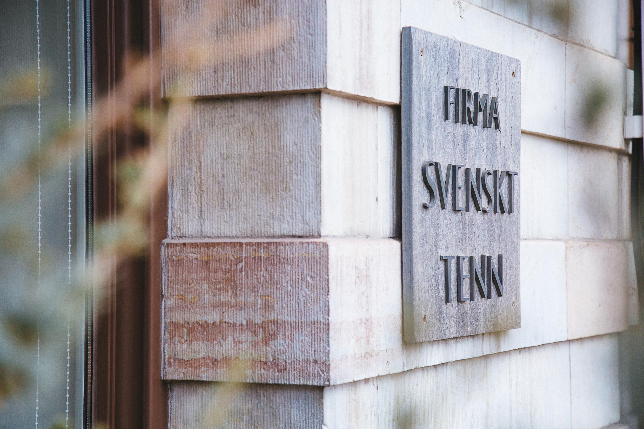 The signage of Svenskt Tenn on the building for the shop on Strandvägen.