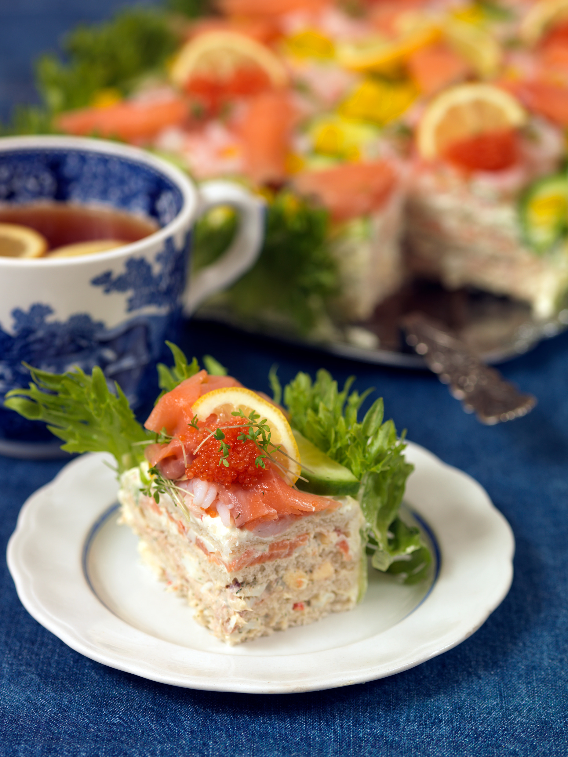 A piece of sandwich cake on a plate.