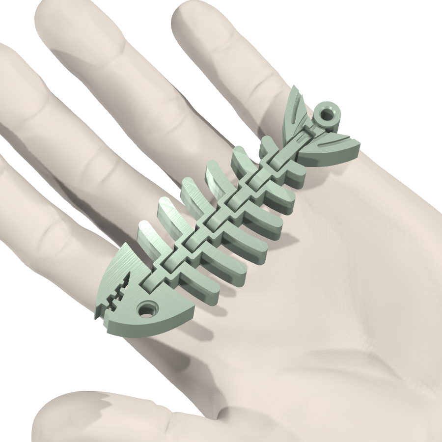 bild nr 4 på produkten: Fiskfossil-nyckelring, ett flexibelt och dekorativt tillbehör inspirerat av fossila fiskar, som kan användas för att hålla reda på dina nycklar