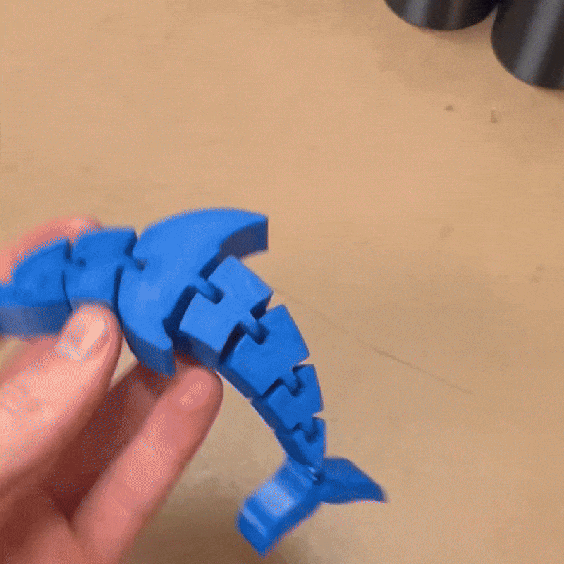 GIF på produkten: Flexi Delfin - Med Rörliga Leder